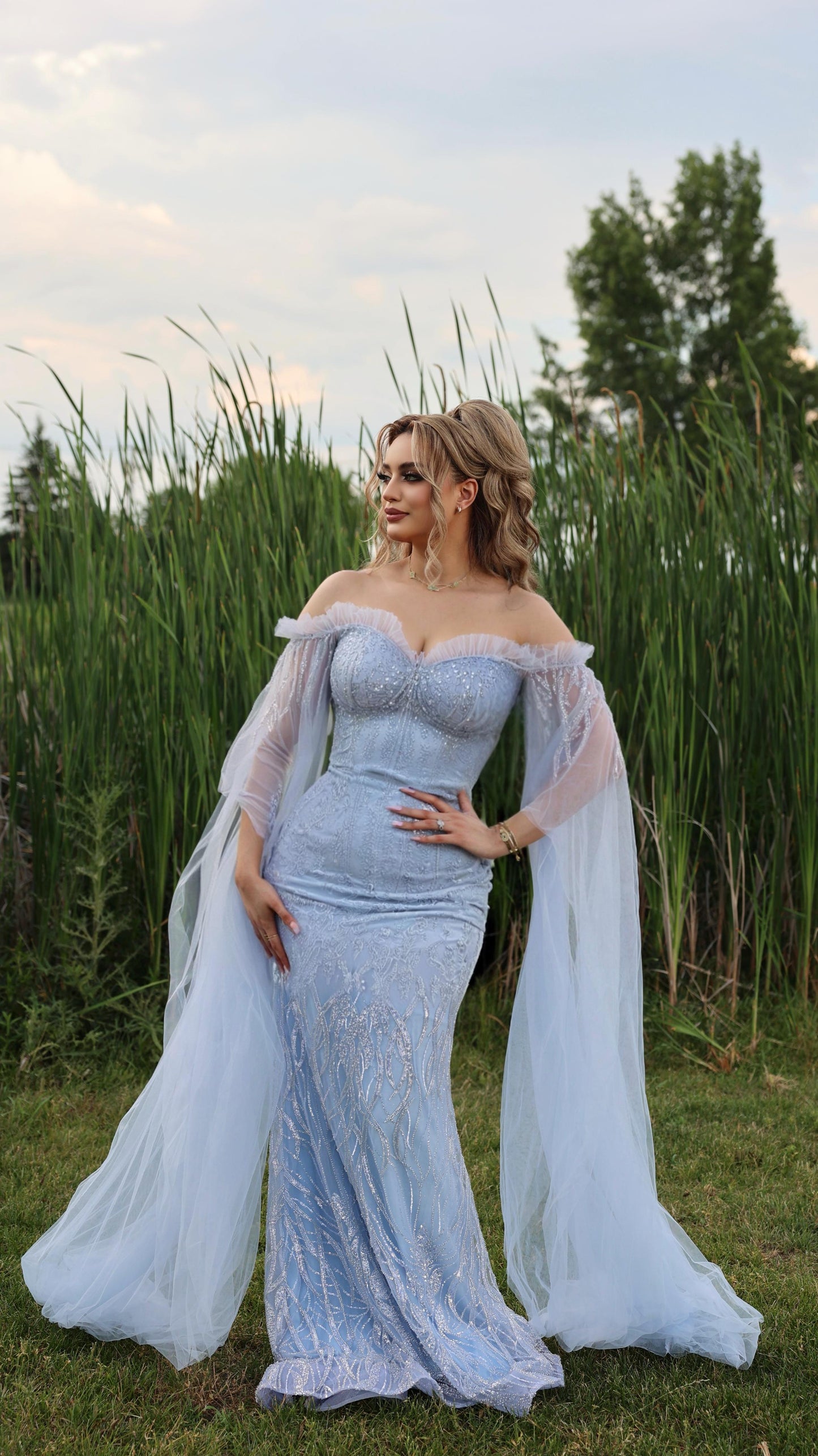 Baby Blue Lebanese Designer Strapless Dress with Beaded Voile Sleeves .